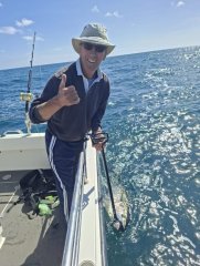 Charlie with a BFT caught on Reel Magic.jpg